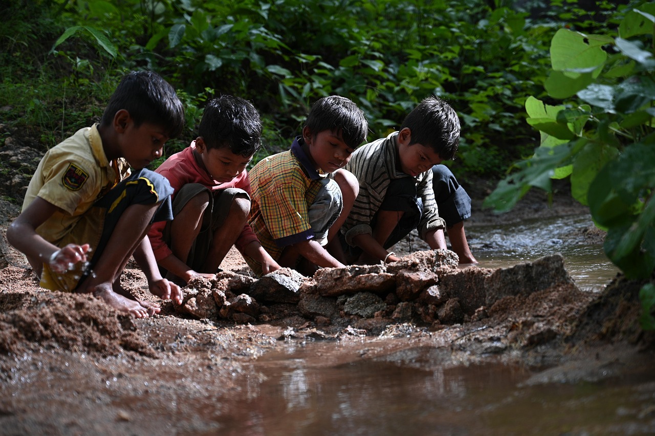 Little Cedars preschool children playing mud kitchen